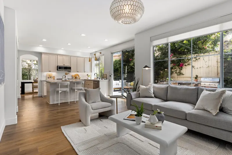 Family room open to the kitchen showing the open floor plan at 5353 Renaissance Ave San Diego