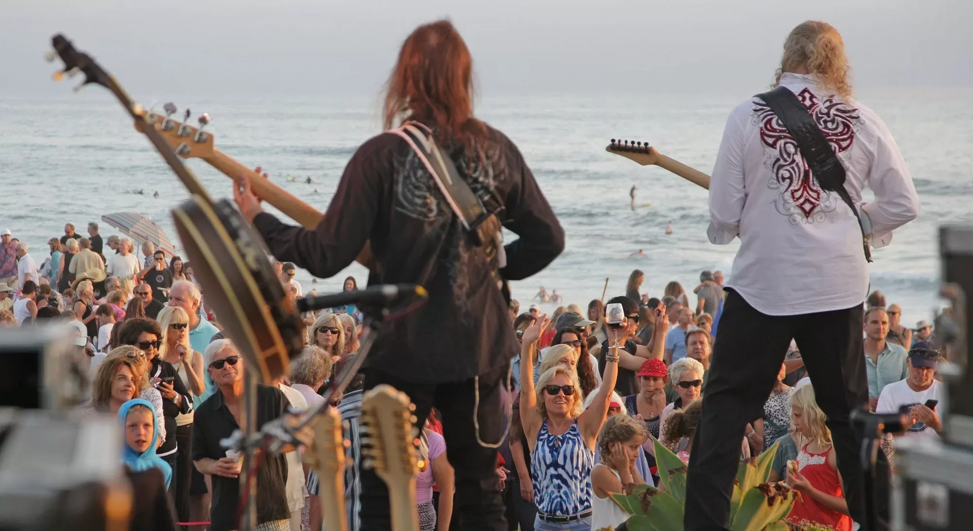 A summer twilight concert on the lawn at Powerhouse Park in Del Mar