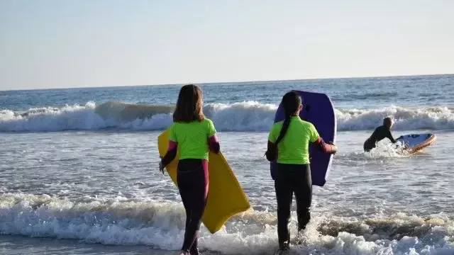 Kelli-Miller-Encinitas-Realtor-Surf-Camp-for-Special-Needs-Kids-Surfing-Madonna-Oceans-Project-Luxury-Real-Estate