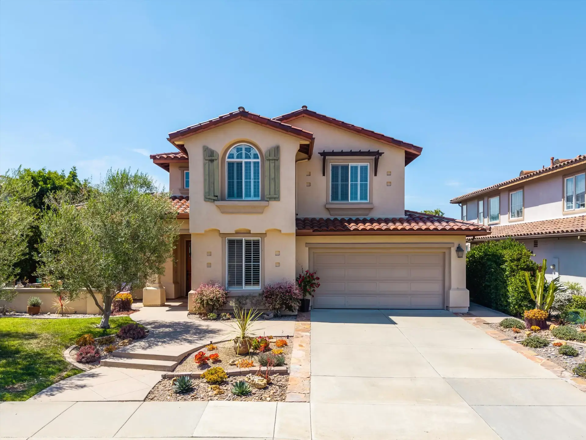 Front exterior of 2198 Vista La Nisa Carlsbad Mediterranean estate listed by Kelli Miller Compass