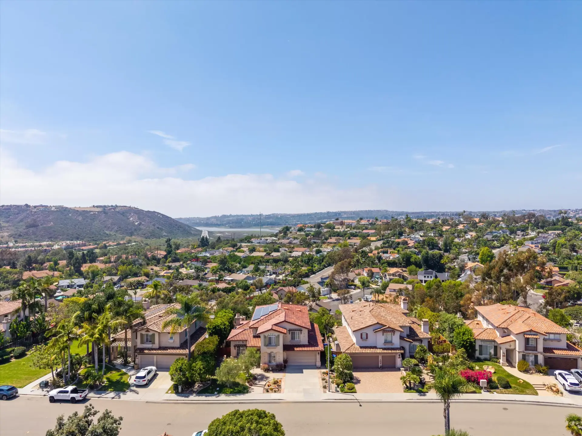Aerial view of the front of 2198 Vista La Nisa looking toward Batiquitos Lagoon, listed by Kelli Miller Compass