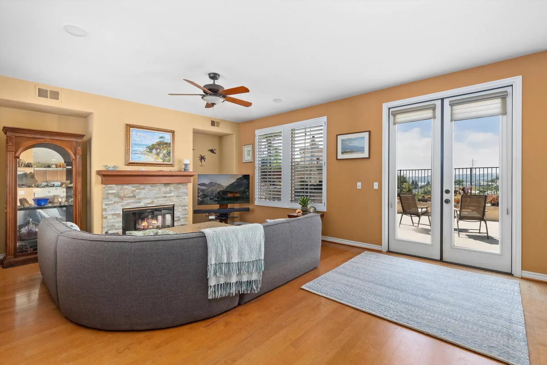 Living room with hardwood floors at 2198 Vista La Nisa Carlsbad listed by Kelli Miller Compass