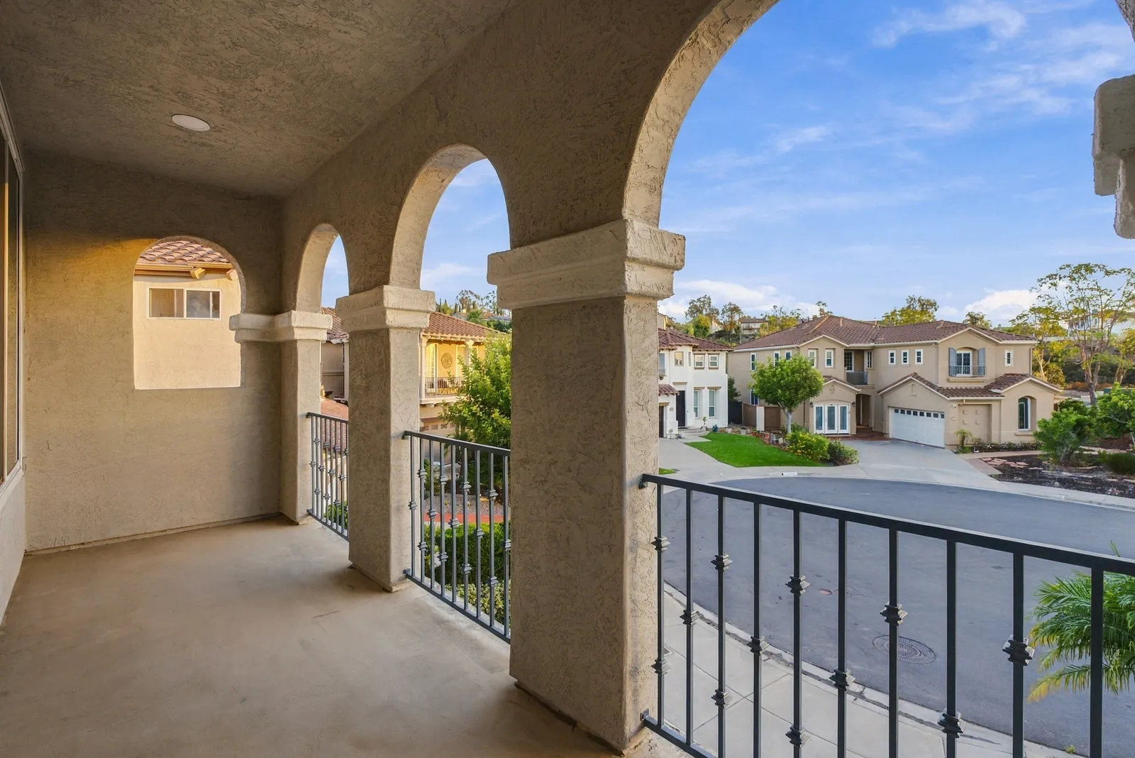 Arched covered balcony off the game room overlooking the cul-de-sac at 12086 Little Silver Ct, Scripps Ranch, San Diego