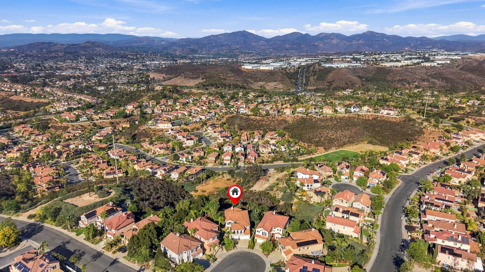 Aerial of Scripps Ranch with the home marked and mountains on the horizon at 12086 Little Silver Ct, Scripps Ranch, San Diego