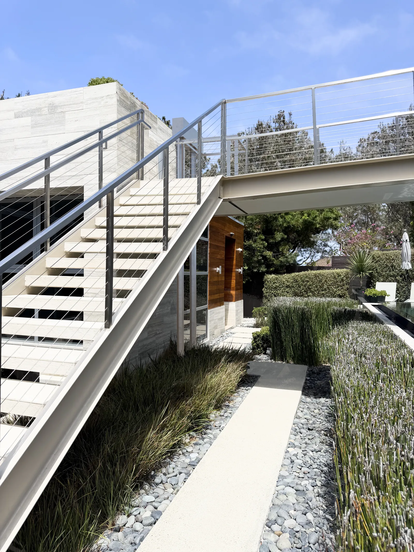 Conceptual rendering from the bottom of the entry stairs below the bridge at 116 Nob Ave Del Mar listed by Kelli Miller, Encinitas Realtor | Compass