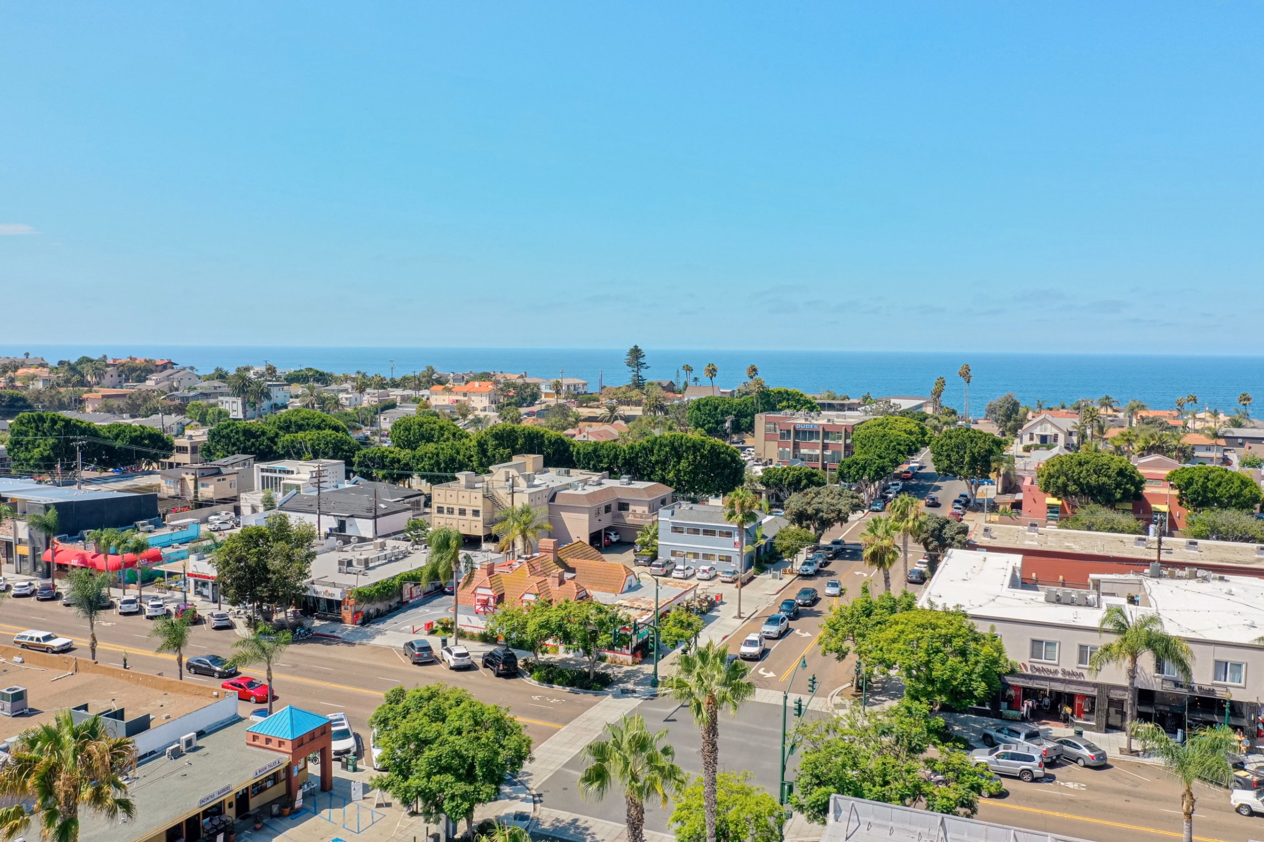 Aerial view of downtown Encinitas with the Pacific Ocean in the distance